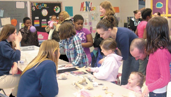 At Mack Benn Jr. Elementary last Tuesday, parents and teachers participate in a math and science night, which teacher and organizer Liz Petry said emphasized the fun aspects of the two subjects.