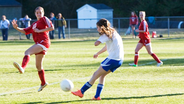 Nansemond-Suffolk Academy junior Morgan Davis takes a shot against Cape Henry Collegiate School during the Lady Saints' latest game on Tuesday at home. NSA lost 8-0, making its 2013 record 0-2-1, but it has another opportunity today when it visits Currituck County High School.