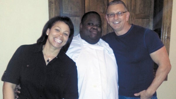 Television chef Robert Irvine dined at North Suffolk’s River Stone Chophouse Monday, presenting service manager Terri Truett and sous chef Chris Jones with a celebrity photo-op. Irvine was reportedly impressed with the restaurant’s beef-aging room, which he peeked inside after eating a medium New York strip.