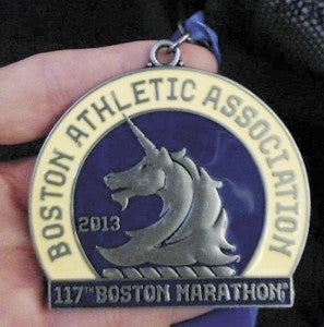 Matt Trangenstein shows his Boston Marathon finisher’s medal. (Courtesy of Matt Trangenstein)