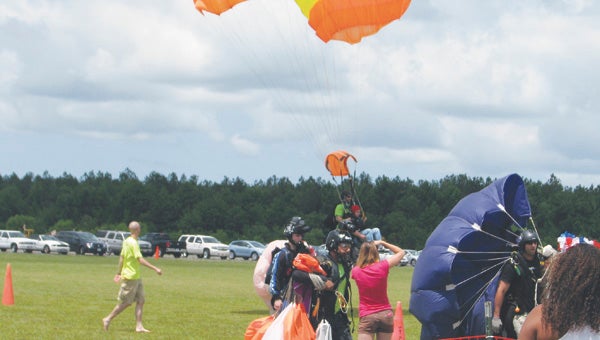 A wounded warrior completes his skydive during last year’s “Jumping for a Purpose” event at Skydive Suffolk. The event, renamed the “Spring Boogie,” will take place again this weekend at the Suffolk Executive Airport.