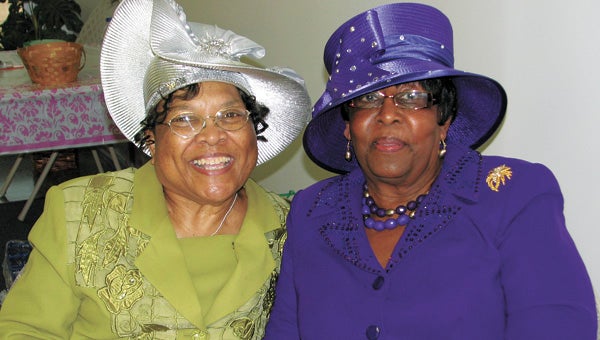 Arlethia Ward, left, and Heloise Bagley enjoy the Mother’s Day tea Friday at the LW’s Center on Old East Pinner Street. The tea was put on by the Suffolk Redevelopment and Housing Authority to honor mothers in the community.