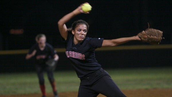 Nansemond River senior Sydney Glover pitched with conviction in her final innings as a Lady Warrior on Tuesday night against Hickory High School in the district tournament semifinals at Nansemond River High School. Despite her team's season-ending 16-7 loss, Glover finished strong by throwing four of her seven strikeouts in Hickory's last two innings at bat.