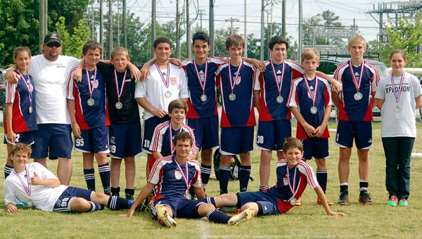 SYAA’s U-15 Hurricanes swept the competition in the Interleague, with an undefeated season and round robin post-season tournament to claim the championship. Front: Daniel Tallarico; middle row, from left: Zachary Pauley, Cody Faust and Nicholas Griffin; back row, from left: Vivian Waddell, coach Chris Pauley, Kenny Tallarico, Killian Arnold, Michael Landon, Yousef Armoud, Jacob Littlefield, Shane Spencer, Ryan Huhtala, Dustin Heard and Elizabeth Arnold.