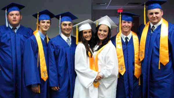 The class of 2013 at Suffolk Christian Academy is all smiles after their graduation ceremony. From left are Clinton Byrd, Nathan VanDorn, Matthew Snead, Michaela Jones, Janna Williams, Wayne Conner and Hudson Boudet.