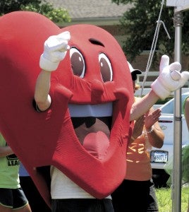 The American Heart Association’s heart mascot cheers for the winning teams during the awards ceremony.