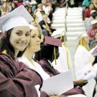 An elated Kyla Gentry-Spears sits among the 349 graduates at King’s Fork High School. 