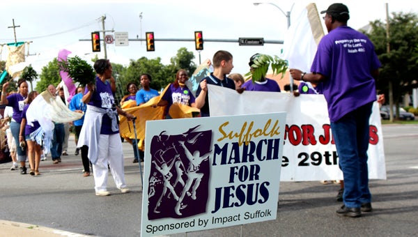 The March for Jesus moved through downtown Saturday, bringing together hundreds of worshippers from different Suffolk churches for a common cause. They were united in their wish to publicly proclaim their faith in God. 