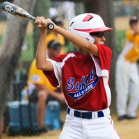 Hunter Hayden of the SYAA Bronco Nationals All-Star team awaits a pitch during pool play on Saturday in the SYAA baseball invitational. Moments later, Hayden singled off the pitcher, driving home two runs.