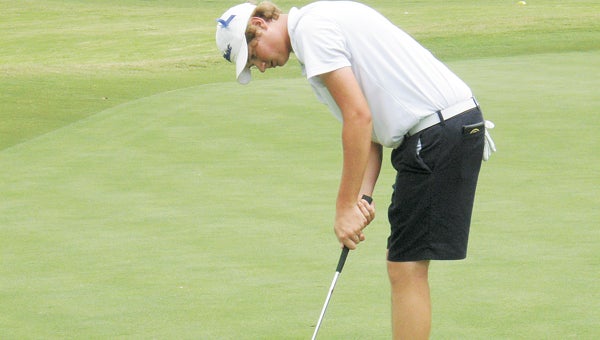 Nansemond-Suffolk Academy rising junior Keith Cooper putts on the second day of the College Prep Golf Tour tournament last weekend at Sleepy Hole Golf Course. Cooper came in second among 39 competitors in the College Prep Boys Division with a two-day score of 147.