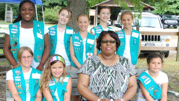 Members of Girl Scout Troop 4313 from Suffolk conducted the flag ceremony for the new pool and low-ropes course at Girl Scout Camp Darden on June 29 and had the opportunity to meet Franklin Mayor Raystine Johnson-Ashburn. Participants included (front row, from left) McKayla Nave, Maegan Broglin, Franklin Mayor Raystine Johnson-Ashburn and Carmen Delvecchio; and (back row, from left) Courtney Washington, Kaitlyn Grover, Chole Swerda, Falon Jones and Madison Swerda.