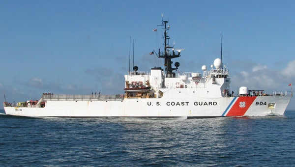 The Coast Guard Cutter Northland is seen at sea, preparing to enter the Chesapeake Bay as it returns from Haiti. The ship was involved in an at-sea rescue of a Haitian vessel as well as a transfer of seized cocaine to the Drug Enforcement Administration.