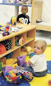 At the Children’s Center off Wilroy Road, Camden Towns, 13 months old, and 8-month-old Garrett Bruehl get prepared for the years of education ahead. The center’s Early Head Start and Head Start programs will be reduced due to federal funding cuts.