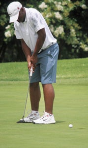 Ben Hunter of Suffolk sinks a putt during the Eastern Amateur Golf Championship last weekend at the Elizabeth Manor Golf and Country Club. Hunter made the cut and shot a two-over par 282, tying for 40th out of 168 players from 11 different countries in his second appearance at the highly esteemed event.