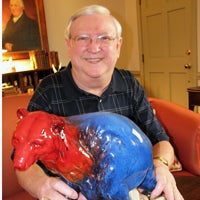 Bear: Lee King shows off his Royal Doulton bear in his home on Friday. King and the bear appeared on a 1998 episode of “Antiques Roadshow,” and the episode recently aired again with an updated value.