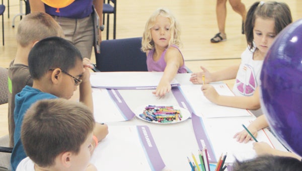 At Taylor Bend YMCA in Western Branch on Thursday, children get to work designing their dream playground. The fun activity will provide inspiration for an actual playground being developed at the Y.