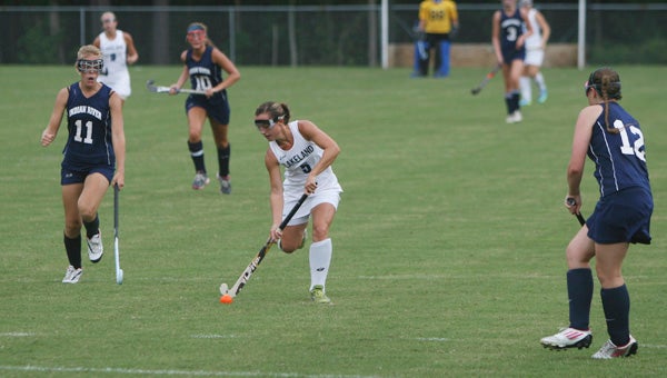 Lakeland High School senior Alexis Albright pushes through the Indian River High School defense during Wednesday’s home opener for the Lady Cavaliers. Albright scored three goals in Lakeland’s 9-0 mercy-rule shortened win.