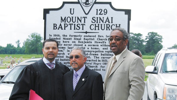 Among those who spoke at the dedication of a historical highway marker in Suffolk on Sunday were, from left, the Rev. William L. Lang, Delegate Algie Howell and Col. Wardell Baker.