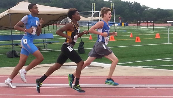 Dillon Wasinger of the Suffolk New Energy Youth Running Team leads a group of runners during the 800 meters at a regional track and field meet in Maryland this past July. (Photo submitted by Steven Sheppard)