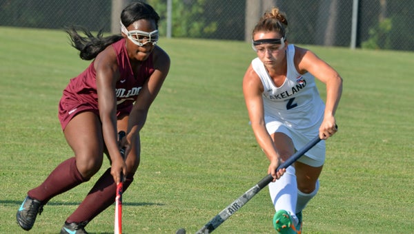 Lakeland High School senior Jamee Albright advances the ball as King's Fork High School junior Lexus Mills defends on Wednesday. Albright contributed a goal in the Lady Cavaliers' 8-1 home win. (Melissa Glover photo)