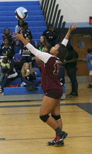 King’s Fork High School junior outside hitter Taylor Harrell serves at a recent game this season for the Lady Bulldogs. Head coach Sarah Porter has appreciated Harrell taking a leadership role this season to help elevate the program’s success from 2012.