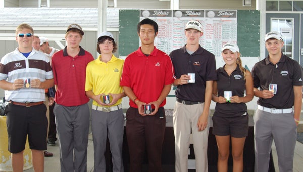 Nansemond River High School senior Griffin Genier, second from left, stands among the top individual finishers at the 2013 VHSL 4A State Golf Championships after tying for second on Tuesday in Harrisonburg. From left: first place finisher Erik Dulik, second place finishers Griffin Genier, Paul Odenwaldt, Zeke Shen and fifth place finishers Luke Hill, Emily Salamy and Trevor Tremps.