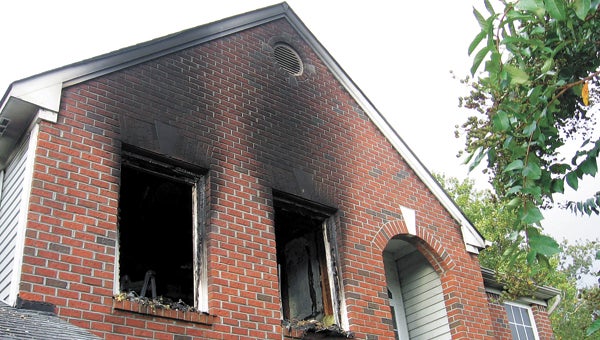 Damage to the second floor of a home on Ashmeade Court is shown after firefighters extinguished the blaze on Wednesday morning.