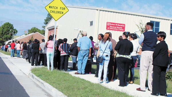 Hundreds of jobseekers line up to enter a job fair Friday at the Salvation Army building on Bank Street. Attendance at the event far outstripped what organizers were expecting.