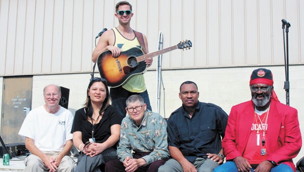 Western Tidewater Community Services Board held an appreciation day for consumers Wednesday. Kevin Mac, who kept them all entertained with his vocals and guitar, poses for a photo with Johnny Spice, Jennifer White, a peer support specialist with the board, Richard Bowden, Kenny Frances and John Wilcox.