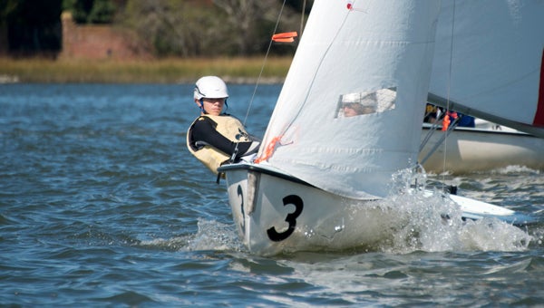 Nansemond-Suffolk Academy eighth-grader Ian Lotz serves as skipper during the recent Virginia Interscholastic Sailing Association championships at the Norfolk Yacht and Country Club.