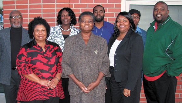 The cast and playwright of “Ghetto Tramp” pause for a photo. In the front row from left are Clintonia Walton-Saylor, Jo Ann Jones and Elke Boone. In the back row from left are Phillip Jennings, Brenda Newby, Gloston Wooten, Renee Shivers and James Rich.