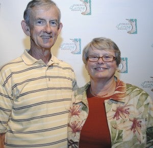 Brad Halcums and Pam Courtney, both volunteers at the Virginia Living Museum in Newport News, were recognized at a ceremony in October for reaching volunteer milestones.