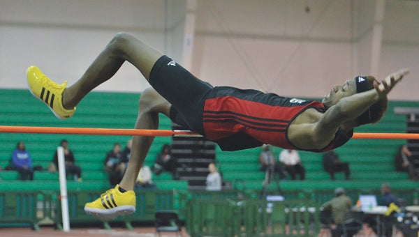 Nansemond River High School’s Keion Roberts competes on Thursday at the first district regular season indoor track and field meet in Hampton. Roberts finished second in the high jump for the Warriors, who finished fourth in the overall meet.