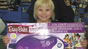 Ashley Cullipher shows off the Easy Bake Oven she bought herself for Christmas.