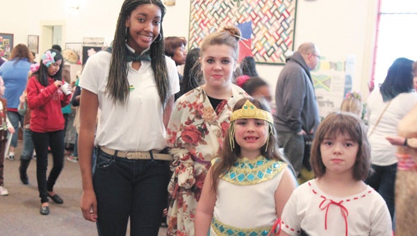 Local Girl Scouts gathered at Oakland Christian Church Saturday for the movement’s annual Thinking Day. Including Amesha Miller, 14, Kami Davenport, 13, Grace Jordan, 7, and Lauren Lassiter, 7, they presented research projects on different nations, including Jamaica, Japan, Egypt and Germany.