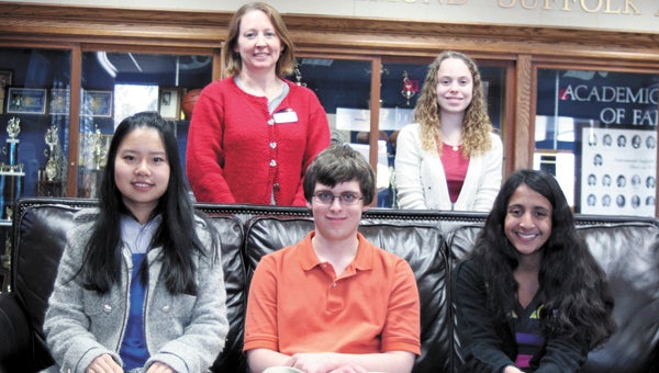 Nansemond-Suffolk Academy juniors Kiraney Zhang, Matthew Allison and Maya Venkataraman, seated, as well as Madeline Robinson, standing to the right of educator Megan Edwards, were selected for the 2013-2014 Virginia Aerospace Science and Technology Scholars Program.