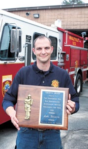 Josh Towers, the recipient of Whaleyville Volunteer Fire Department’s 2013 Chief’s Award, says he loves volunteering with the organization. He’s in his eighth year there.