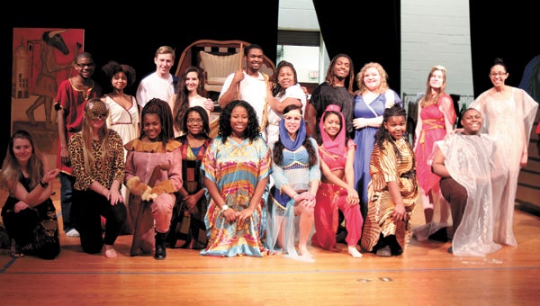 Nansemond River High School students pause for a photo during dress rehearsals Tuesday for “The Survivors.” In the front row are Madeline Kowalski, Ashley Kuchynka, Myranda Hill, Kiana Wilkerson, Phylicia Nixon, Trinity Torres, Brittany Johnson, Yvette Gamor and Jaylen Daniels. Standing are Christian Ellis, Rayna Johnson, Cody Edwards, Alexis Hernandez, Harold Hodge, Louisa Gamor, Rolonzo Rawles, Cady Strickland, Amy Rice and Rachel Josey.