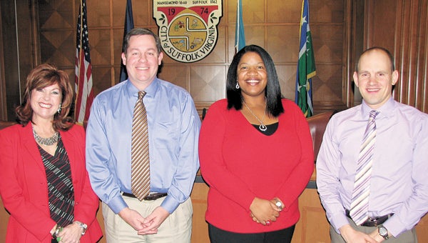 Members of the city’s Media and Community Relations Department recently were honored for their work on the 2013 City Council retreat video. Pictured from left are Media and Community Relations Director Diana Klink, Media and Community Relations Manager Tim Kelley, Video Production Assistant RaJeana Price and Video Production Coordinator Andy Franklin.