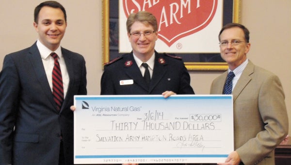 Virginia Natural Gas made a $30,000 donation this week to EnergyShare. From left are George Faatz, manager of legislative and community affairs, Virginia Natural Gas; Brett Meredith, captain of the Salvation Army Hampton Roads Area Command; and Robert Duvall, vice president of operations, Virginia Natural Gas.