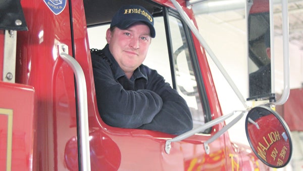 Lt. Chad Smith, a volunteer with Holland Volunteer Fire Department, was named its 2013 Firefighter of the Year.