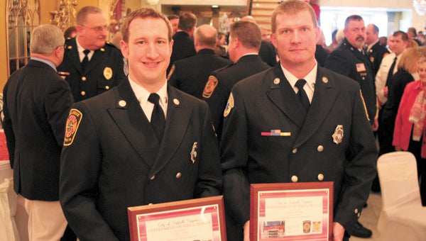 Daniel Pelzel, Paramedic of the Year, and David Dickens, Firefighter of the Year, were honored during a Suffolk Fire and Rescue Promotion and Award Ceremony at The First Lady on Thursday.