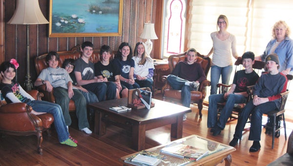 From Washington state, middle-schoolers Isa Trujillo, Miles Epstein, Silas Gardener, Nick Spranger, Case Foster, Julia Ellison, Campbell Foster, Kasey Kirschling, Jacob Gold and Tor Ormseth, and, standing, teacher chaperones Erin Blaser and Leslie Blair, are staying at Cherry Grove Plantation in North Suffolk while exploring historical locales in Hampton Roads.