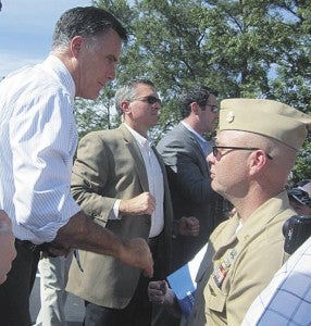 Suffolk’s David Gil Wilkinson meets then-presidential candidate Mitt Romney in this photo posted on Wilkinson’s Facebook page on Oct. 17, 2012. Wilkinson, now retired from the U.S. Navy, has been charged with threatening the life of President Barack Obama.