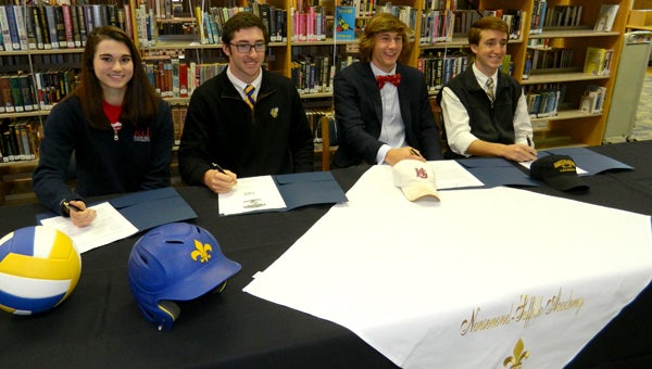 Titus Mohler/Suffolk News-Herald Level up: Nansemond-Suffolk Academy has four more student-athletes committed to colleges. They are, from left: Kaylor Nash, Greg Beale, Zach Leitner and Jacob Edwards.