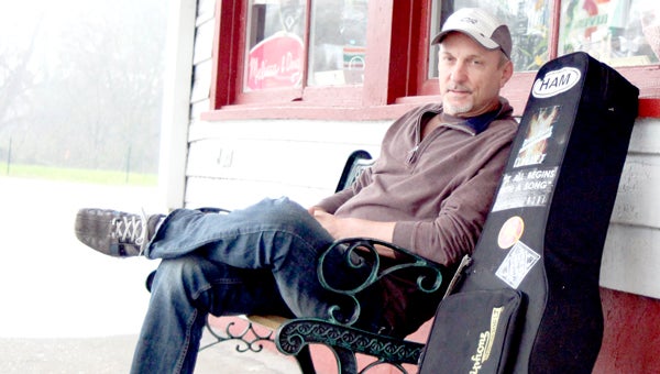 On a rainy Monday, Chuckatuck native Tim Buppert, now a Nashville-based singer-writer, takes in the familiar atmosphere of his boyhood home from the front porch of Gwaltney Store.