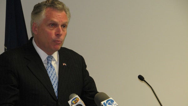 Gov. Terry McAuliffe speaks to a group of business leaders at the Hampton Roads Chamber of Commerce’s Norfolk headquarters on Tuesday. The governor touched on numerous topics, including Medicaid expansion, transportation, the port, tourism, education and more.