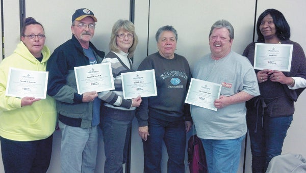 Graduates of the American Lung Association Freedom From Smoking program sponsored by the Suffolk Partnership for a Healthy Community celebrate their achievement. Pictured from left are Pierrette Brusseau, Franklin Powell Jr., Shelia Ward, instructor Sandra Sullivan, John Stephenson and Lisa Barnes.