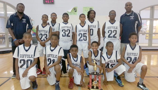 Team Suffolk’s fifth grade team has qualified for the Florida-based AAU National Championships and is seeking donations so it can go compete. Front row, from left: Kendon Peebles, Cameron Edmonds, Luke Williamson, Calvin Beatty, Jordan Horne and Efrem Johnson Jr.; back row, from left: head coach Carlos Hill, George Pettaway, Khiazi Jones, Isaiah Williams, Ryan Williams, Adonte Warmack, Kemauri Spencer and assistant coach Efrem Johnson Sr.
