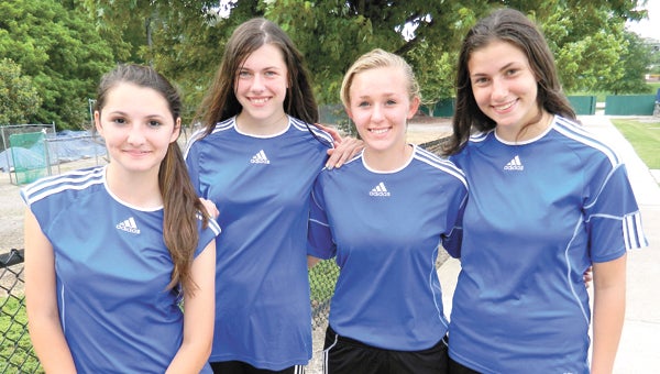 Suffolk Christian Academy soccer players Emma VanDorn, Sidney Tredway, Jenny Rombs and Victoria Twisdale earned all-conference recognition for their roles in the Lady Knights’ successful 2014 season.